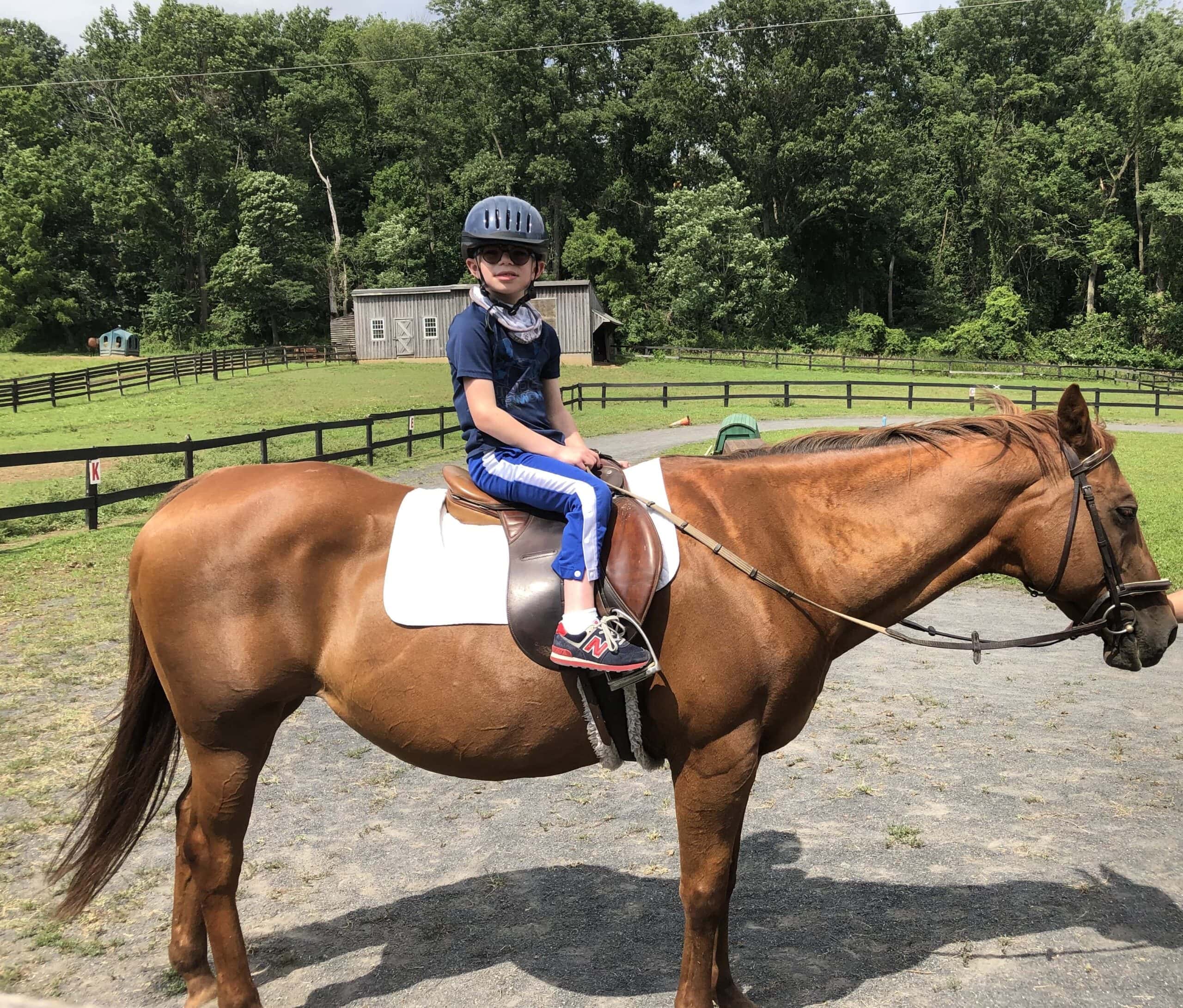 Kid riding a horse