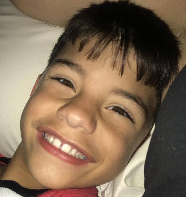 Smiling kid looking at camera